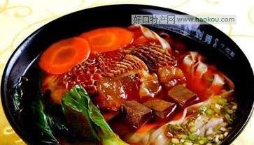 ţ